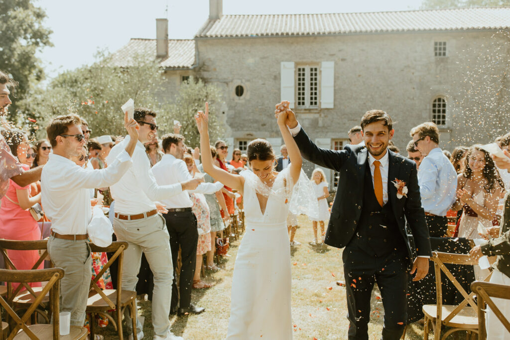 wedding photographer Berlin couple exit the ceremony